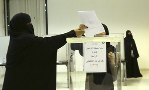 Saudi women vote at a polling center during municipal elections in Riyadh, Saudi Arabia, Saturday, Dec. 12, 2015.