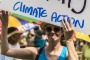 People rally for climate action in Brisbane last month. Australia has ranked poorly on its climate performance among major emitters, according to a new score card.