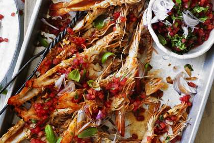 Char-grilled whole prawns with watermelon and basil dressing.