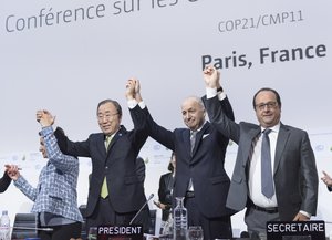 Secretary-General Ban Ki-moon (second left); Christiana Figueres (left), Executive Secretary of the UN Framework Convention on Climate Change (UNFCCC); Laurent Fabius (second right), Minister for Foreign Affairs of France and President of the UN Climate Change Conference in Paris (COP21) and François Hollande (right), President of France celebrate after the historic adoption of Paris Agreement on climate change.