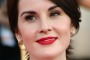 Actress Michelle Dockery, from the series "Downton Abbey," arrives at the 20th annual Screen Actors Guild Awards in Los Angeles, California January 18, 2014.   REUTERS/Lucy Nicholson (UNITED STATES  - Tags: ENTERTAINMENT)  (SAGAWARDS-ARRIVALS)