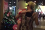 Eliza Szonert holds her son after taking him from a suburban Kuala Lumpur restaurant.
