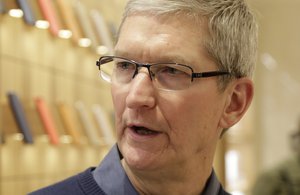 Apple CEO Tim Cook visits the Upper East Side Apple Store, Wednesday, Dec. 9, 2015, in New York.