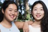 Karen Zhang, left, got 99.95 in her ATAR this year - the same mark as her sister, Kim.