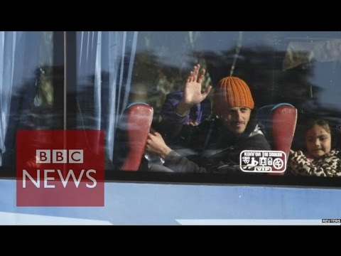 Syria conflict: Inside Homs as fighters and families leave city - BBC News