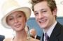 Rob 'Millsy’ Mills, best known for Australian Idol and his romance with hotel heiress Paris Hilton, has opened up about drug use and being “a little bit gay”. The unlikely pair at Melbourne Cup in 2003.