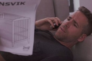 Actor Ryan Reynolds struggling with Ikea's infamous flat pack furniture.