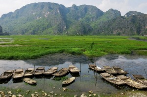 We had a wonderfully relaxing sampan ride through the Van Long Nature Reserve in Ninh Binh, Vietnam, floating through reedy wetlands and surrounded by towering limestone peaks. Ninh Binh is known as the Ha Long Bay on land. Having experienced both, I much prefer the beauty, peace and tranquility of Ninh Binh.