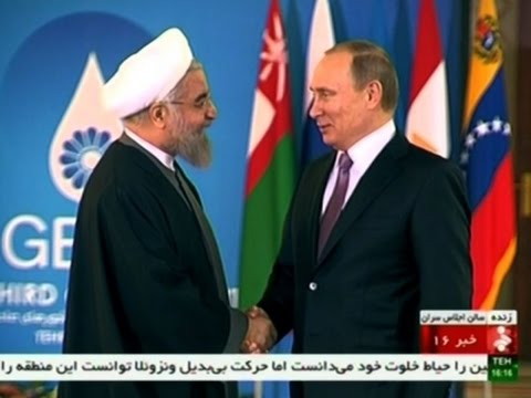 Raw: Putin meets Iran's President in Tehran