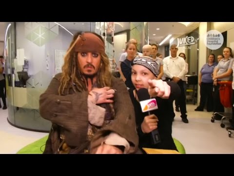 Johnny Depp surprises sick children in Australian hospital