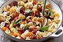 Orrechiette with cherry tomatoes, basil and pine nuts.