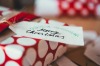 DIY Christmas present wrapping: Christmas gift box with a 'Merry Christmas' paper tag.