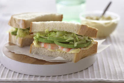 Prawn, mayonnaise and iceberg lettuce sandwich.