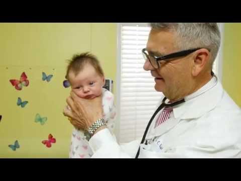 A pediatrician shows you how to calm a crying baby