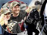 Gwen Stefani and Blake Shelton share an intimate photo together before getting on a privet yet out of Los Angeles\n\nPictured: Gwen Stefani and Blake Shelton\nRef: SPL1201004  271215  \nPicture by: Clint Brewer / TC / Splash News\n\nSplash News and Pictures\nLos Angeles: 310-821-2666\nNew York: 212-619-2666\nLondon: 870-934-2666\nphotodesk@splashnews.com\n