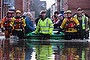 *** BESTPIX *** YORK, ENGLAND - DECEMBER 27: Members of Cleveland Mountain Rescue and soldiers from 2 Battalion The Duke of Lancasters Regiment assist members of the public as they are evacuated from the Queens Hotel in York city centre as the River Ouse floods on December 27, 2015 in York, England. Heavy rain over the Christmas period has caused severe flooding in parts of northern England, with homes and businesses in Yorkshire and Lancashire evacuated as water levels continue to rise in many parts. (Photo by Ian Forsyth/Getty Images)