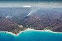 Fires still burn in the hills above Wye River on Monday and could cause difficulty for firefighters as the weather worsens later in the week.Photo: Jason South