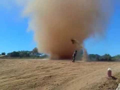 People playing with a Tornado! (dust devil)