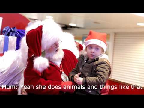 Santa signing to child