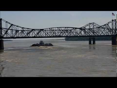 Mississippi River Flood 2011  Barges battling the current at Vicksburg