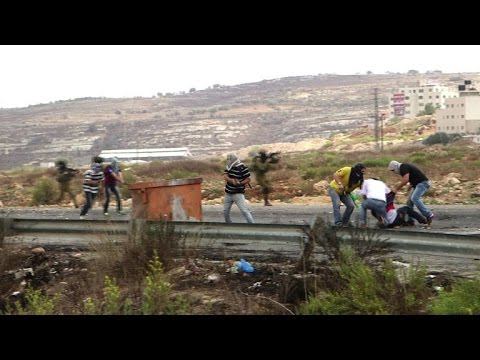 Palestinian stone throwers wounded by 'undercover Israelis'