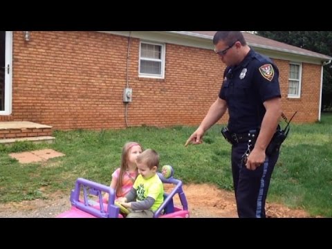 Police Officer Dad 'Pulls Over' Kids in Power Wheels, Gets Funny Reaction