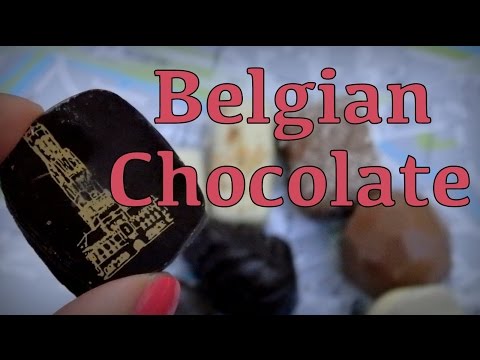 Eating delicious Belgian chocolates in Bruges