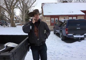 Ryan Bundy talks on the phone at the Malheur National Wildlife Refuge near Burns, Ore., Sunday, Jan. 3, 2016. Bundy is one of the protesters occupying the refuge to object to a prison sentence for local ranchers for burning federal land.