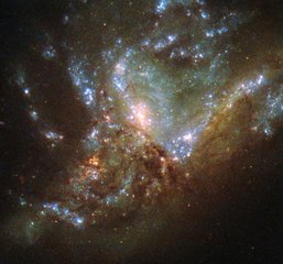 This image, taken with the Wide Field Planetary Camera 2 on board the NASA/ESA Hubble Space Telescope, shows the galaxy NGC 6052, located around 230 million light-years away in the constellation of Hercules.