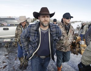 Ammon Bundy, one of the sons of Nevada rancher Cliven Bundy, arrives for a news conference at Malheur National Wildlife Refuge near Burns, Ore., on Wednesday, Jan. 6, 2016.