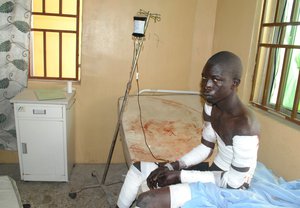 A victim of a Boko Haram attack receives treatment at a hospital, in Maiduguri, Nigeria Monday, Dec. 28, 2015.