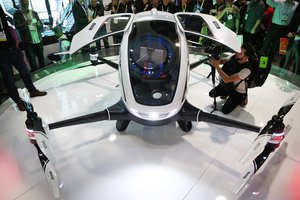 The EHang 184 autonomous aerial vehicle is unveiled at the EHang booth at CES International, Wednesday, Jan. 6, 2016, in Las Vegas. The drone is large enough to fit a human passenger.