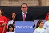 In this file photo dated Wednesday, Sept. 9, 2015, Jordan's Prince Ali bin al-Hussein, flanked by school-age soccer players, speaks to about 300 guests during an event at a Roman amphitheater in Amman, Jordan.