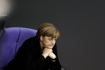 German Chancellor Angela Merkel attends the debate after her speech about the upcoming European Summit at the German parliament Bundestag in Berlin, Wednesday, Dec. 16, 2015.