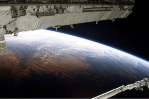 File - The STS-114 crew captured this view of Earth from the Shuttle-Station complex on day nine of the mission.