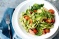 Avocado pesto pasta with hot-smoked salmon