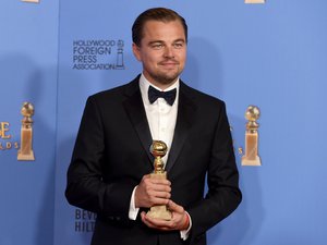 Leonardo DiCaprio poses in the press room with the award for best actor in a motion picture - drama for “The Revenant” at the 73rd annual Golden Globe Awards on Sunday, Jan. 10, 2016, at the Beverly Hilton Hotel in Beverly Hills, Calif.