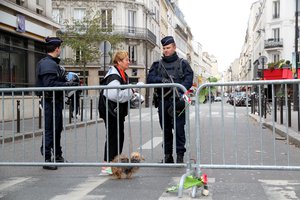 Police patrol in Paris, the day after the attacks