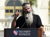 Duck Dynasty star Phil Robertson speaks during a rally opposing the Iran nuclear deal outside the Capitol. The Ted Cruz campaign announced Robertson's endorsement of the Texas senator Tuesday.