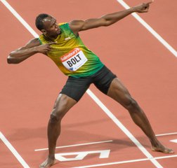 File - Usain Bolt after winning at the London Anniversary Games, July 26 2013