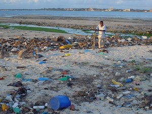 File - Debris including plastic on a beach near Dar es Salaam, Tanzania.