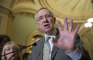 Senate Minority Leader Harry Reid of Nev., joined by Sen. Patty Murray, D-Wash., speaks with reporters on Capitol Hill in Washington, Wednesday, Jan. 20, 2016, before Democrats blocked legislation from the GOP-led House on a bill that would crack down on Syrian and Iraqi refugees entering America.