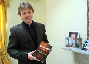 A Friday, May 10, 2002 photo from files showing Alexander Litvinenko, former KGB spy and author of the book "Blowing Up Russia: Terror From Within" photographed at his home in London.