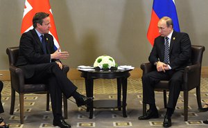 File - In a meeting on the sidelines of the G20 summit in Antalya, Turkey, Russian President Vladimir Putin discussed with British Prime Minister David Cameron the outlook for developing bilateral cooperation, the situation in Syria, and the fight against terrorism, 16 November, 2015.