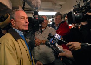 File - Michael Bloomberg, the mayor of New York City, N.Y., speaks to the media aboard the amphibious transport dock ship PCU New York (LPD 21) while under way in the Atlantic Ocean Nov. 1, 2009.