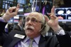 Relief rally around the world: A trader working the floor of the New York Stock Exchange.