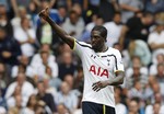 Tottenham Hotspur's Emmanuel Adebayor celebrates his goal against Queens Park Rangers during their English Premier League soccer match at White Hart Lane, London, Sunday, Aug. 24, 2014.