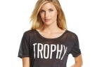 A T-shirt being sold in stores and online in the women's juniors section emblazoned with the word "Trophy" has sparked anger from shoppers on social media