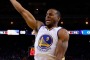 Lopsided: Andre Iguodala goes up for a shot against Jonathon Simmons and Patty Mills at ORACLE Arena.