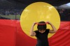 Australia Day: 260114: Sun Herald News: 26th of January 2014: Australians celebrate the National holiday in the Inner-West of Sydney-. Crowds gather at Victoria Park, Glebe for the Indigenous Yabun Festival including Kacey Blakeney (aged 6) positioning her ?frisbee halo? in front of the Aboriginal flag? Photo by James Alcock.

a25093.jpg